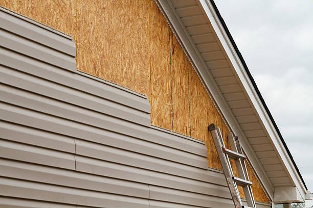 Professional Siding Repair technician working in Newark, TX